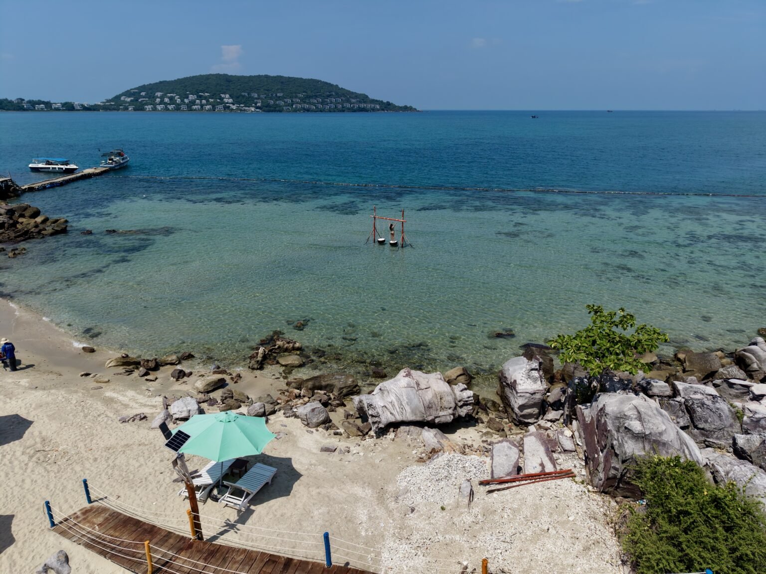 Aerial view of a pier extending into water