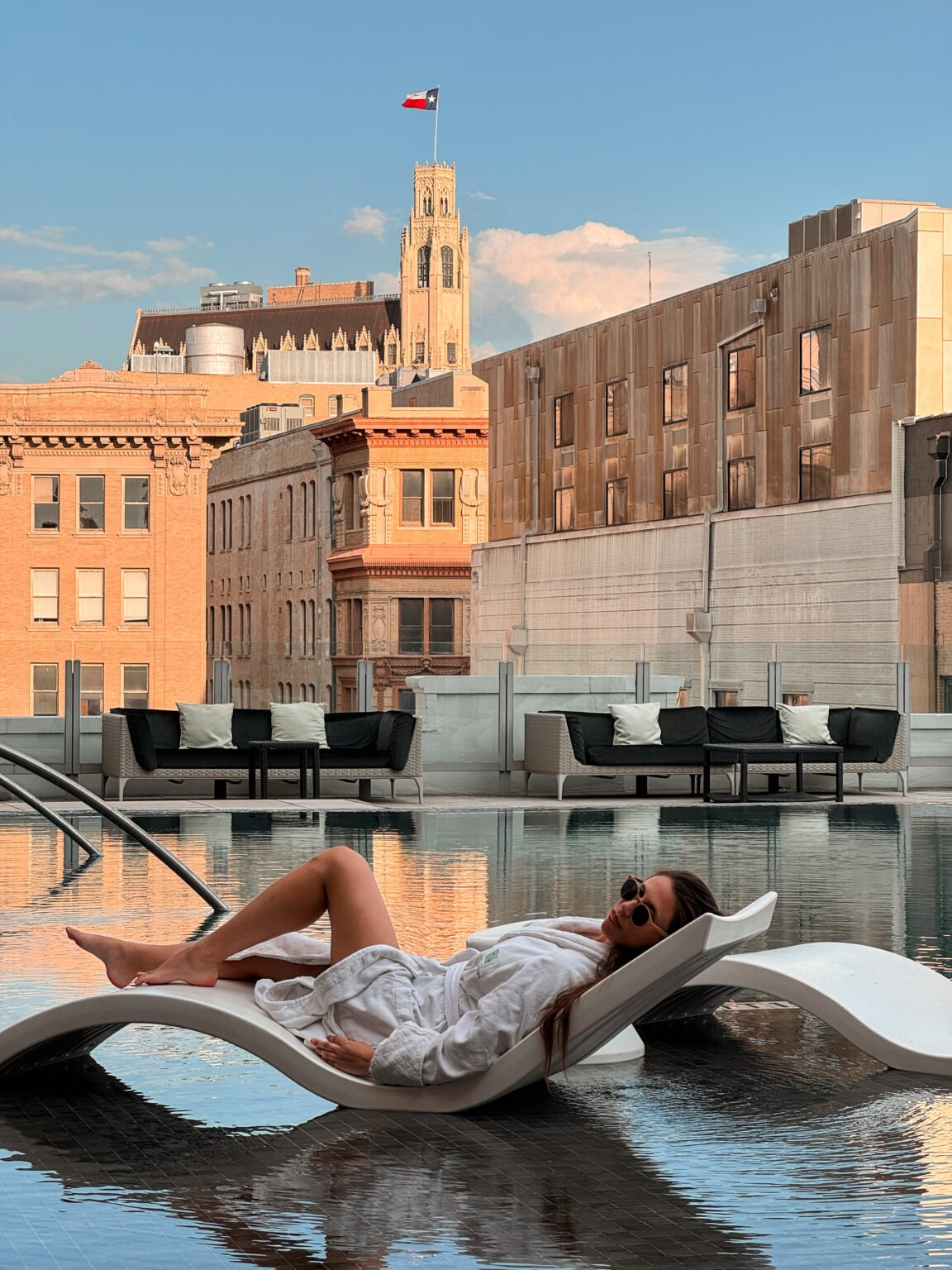 Rooftop pool within an urban travel setting